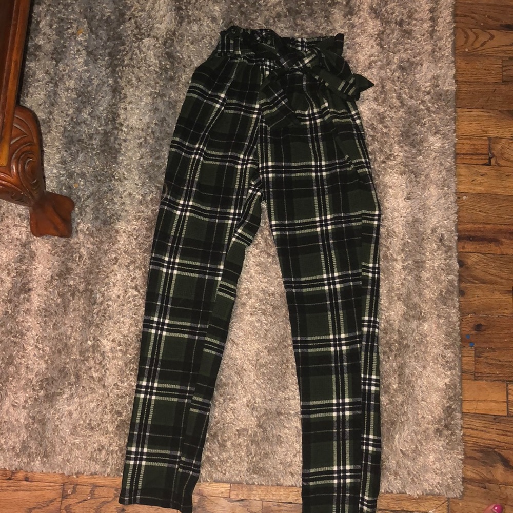 Grey,black, and white plaid pants.